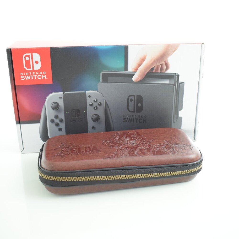 Nintendo Switch HAC-001 32GB Console with Gray Joy‑Con, Zelda case & 8 games inc